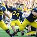 Michigan kicker Brendan Gibbons ties the game with a field goal, late in the fourth quarter at Michigan Stadium on Saturday. Melanie Maxwell I AnnArbor.com